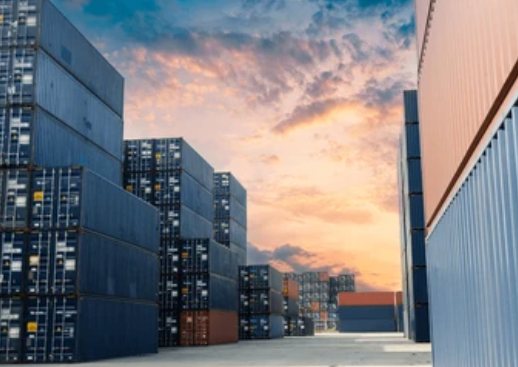 Container stacks at sunset